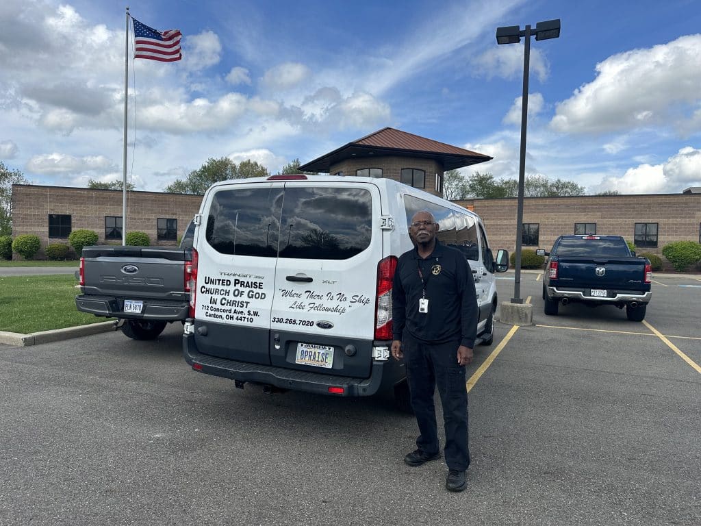 Local 33 retiree James Chester, whose pension was restored by the American Rescue Plan, stands next to his van at the Local 33 union hall.