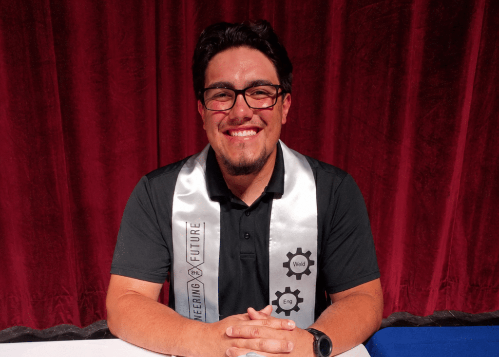 Tobias Romero at Signing Day Table